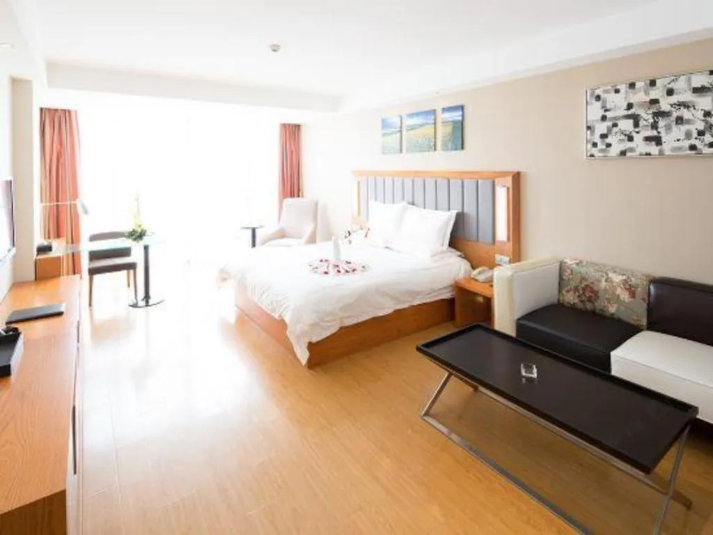 Bed in Warmly Hotel Suzhou Shuanghuwan