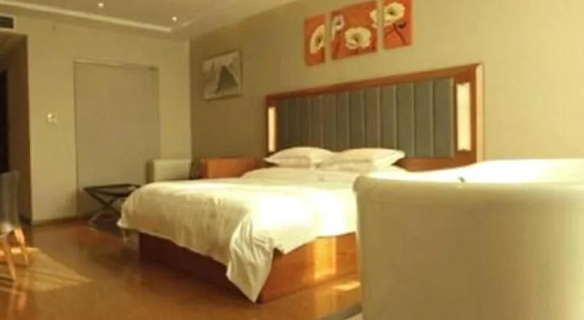 Bed in Warmly Hotel Suzhou Shuanghuwan