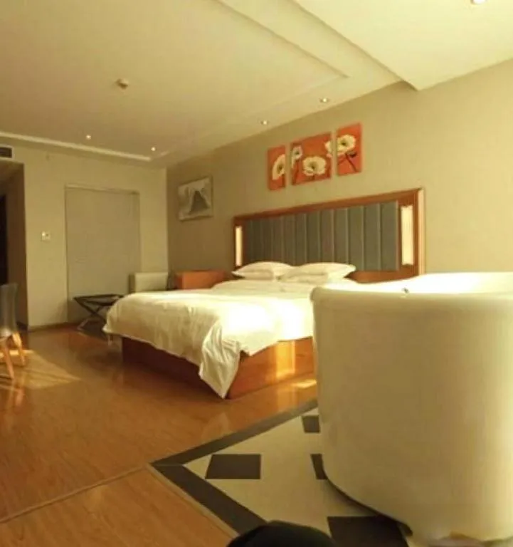 Bed in Warmly Hotel Suzhou Shuanghuwan