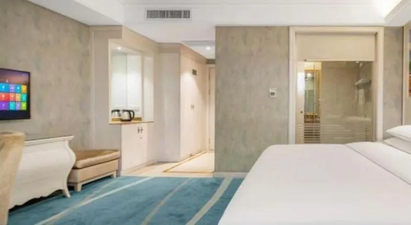 Bed in Vienna Hotel Guiyang Jiaxiulou Jichang Road