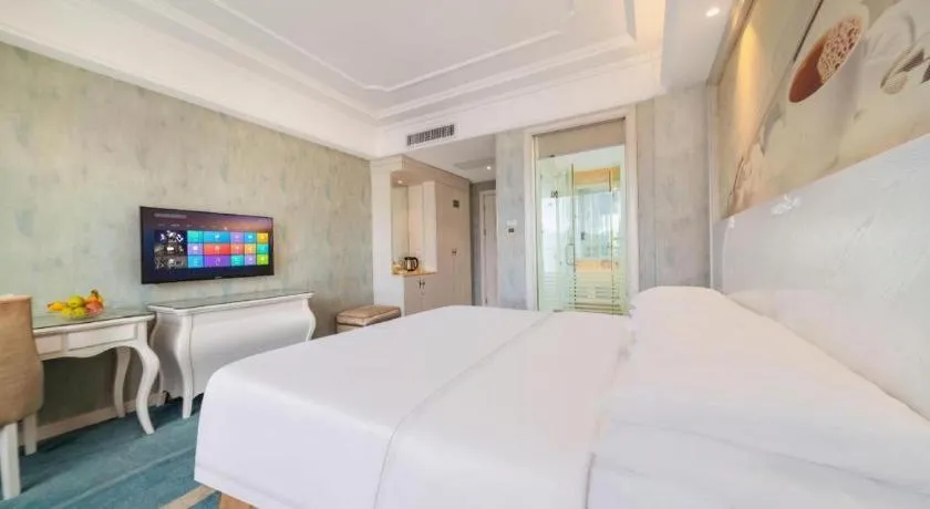 Bed in Vienna Hotel Guiyang Jiaxiulou Jichang Road