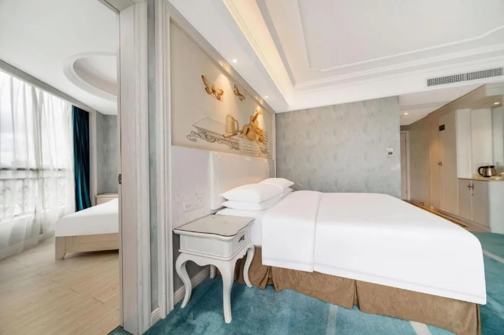 Bed in Vienna Hotel Guiyang Jiaxiulou Jichang Road