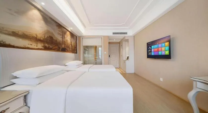 Bed in Vienna Hotel Guiyang Jiaxiulou Jichang Road