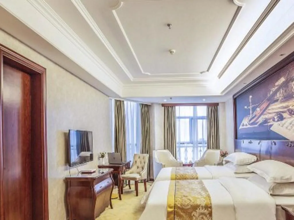 Bed in Vienna Hotel Guiyang Jiaxiulou Jichang Road