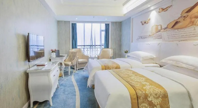 Bed in Vienna Hotel Guiyang Jiaxiulou Jichang Road