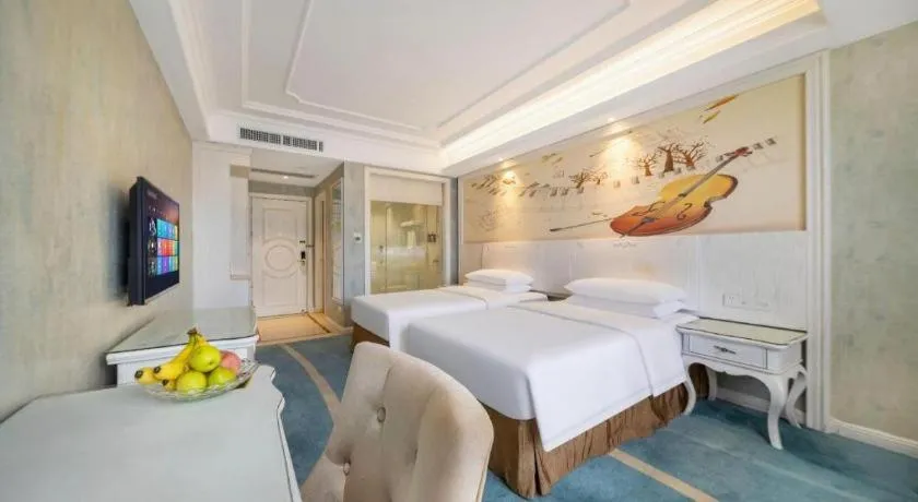 Bed in Vienna Hotel Guiyang Jiaxiulou Jichang Road