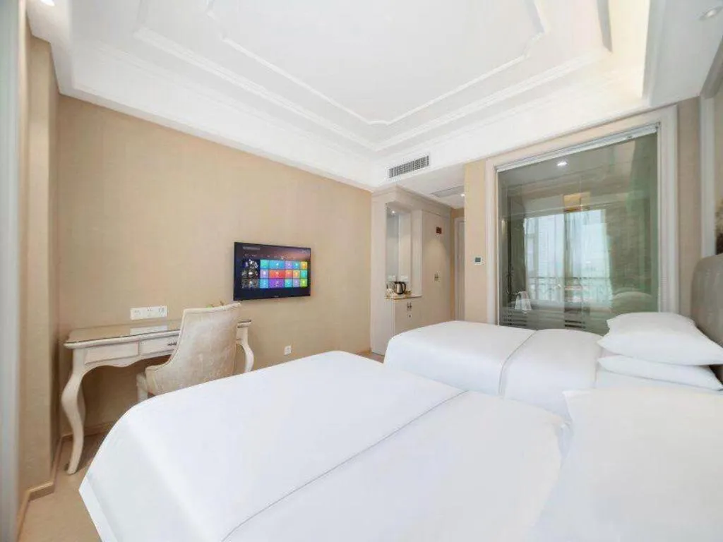 Bed in Vienna Hotel Guiyang Jiaxiulou Jichang Road