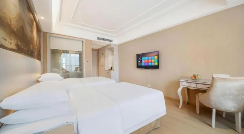 Bed in Vienna Hotel Guiyang Jiaxiulou Jichang Road