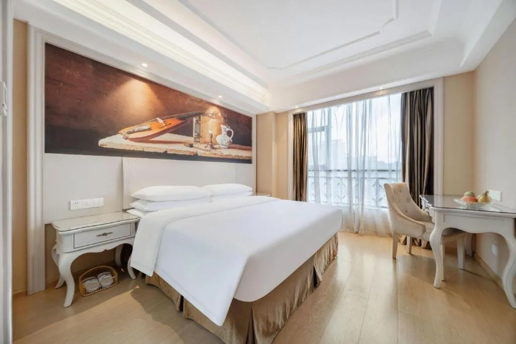 Bed in Vienna Hotel Guiyang Jiaxiulou Jichang Road