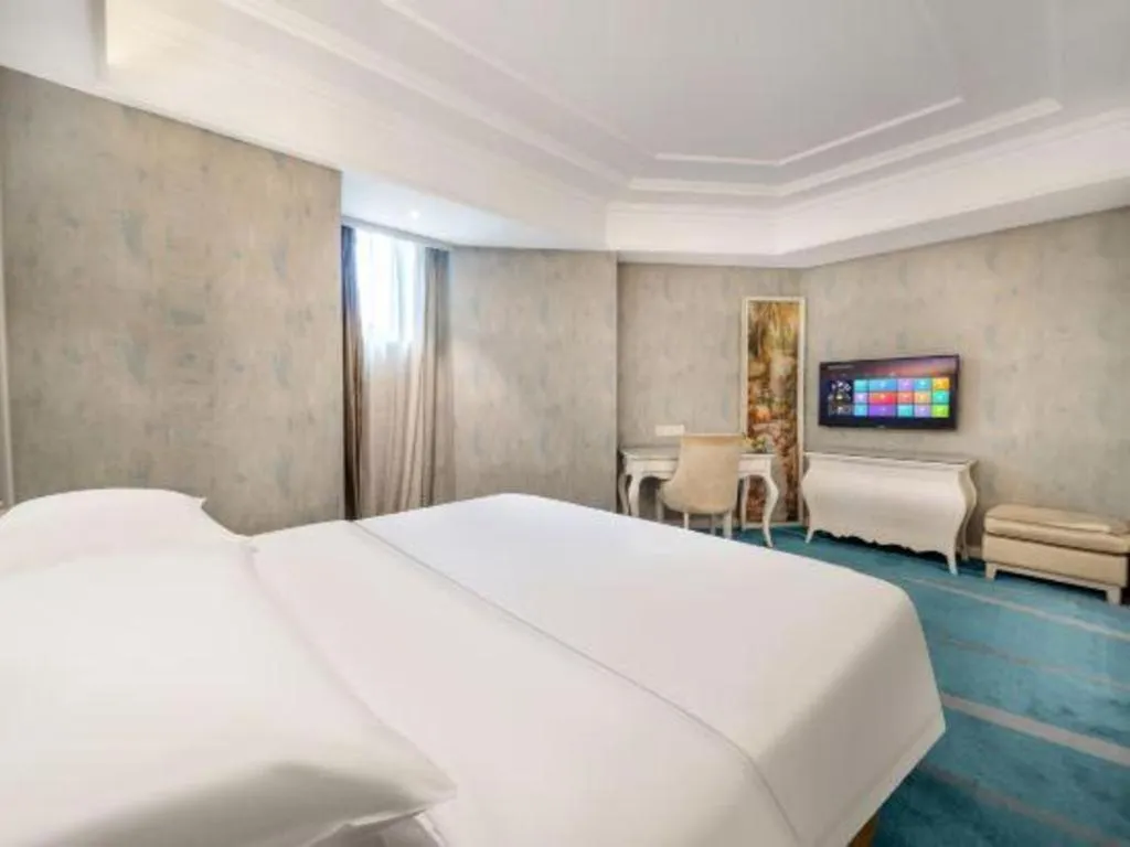 Bed in Vienna Hotel Guiyang Jiaxiulou Jichang Road