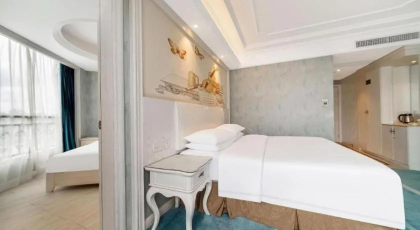 Bed in Vienna Hotel Guiyang Jiaxiulou Jichang Road