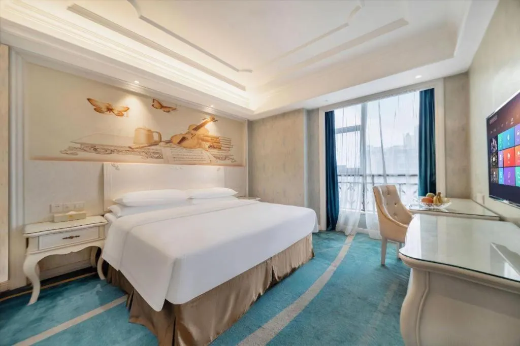 Bed in Vienna Hotel Guiyang Jiaxiulou Jichang Road