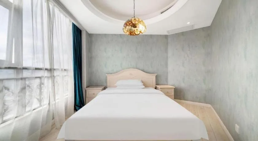 Bed in Vienna Hotel Guiyang Jiaxiulou Jichang Road