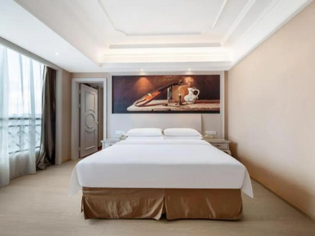 Bed in Vienna Hotel Guiyang Jiaxiulou Jichang Road