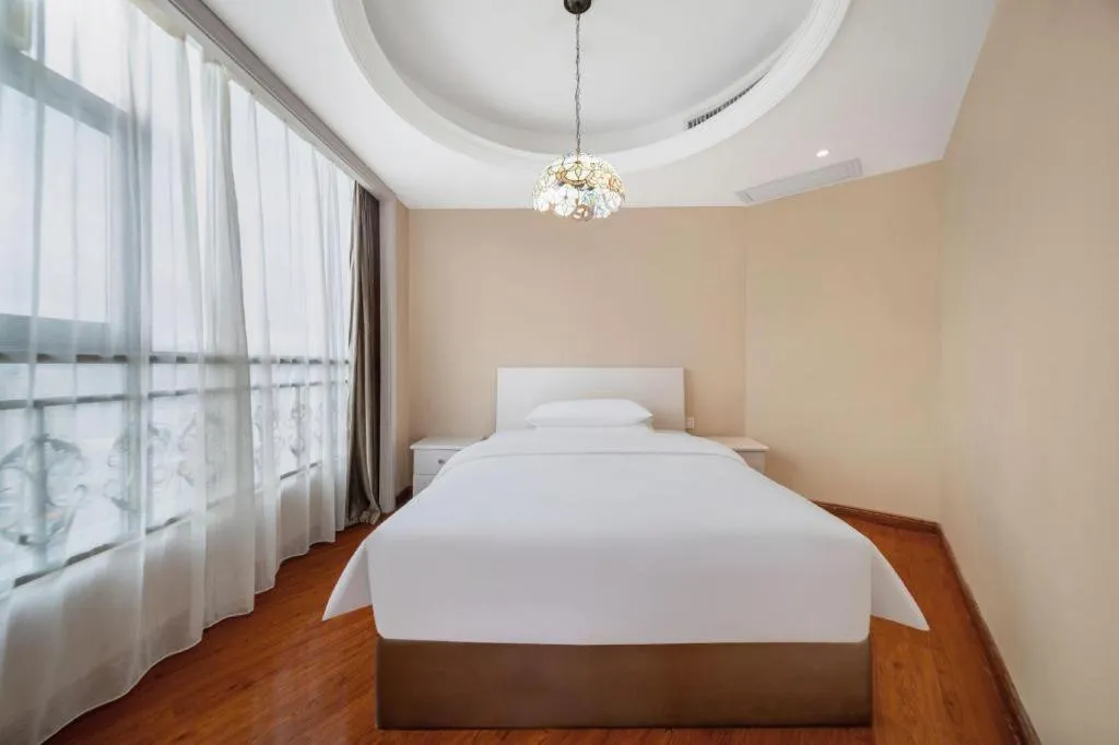 Bed in Vienna Hotel Guiyang Jiaxiulou Jichang Road