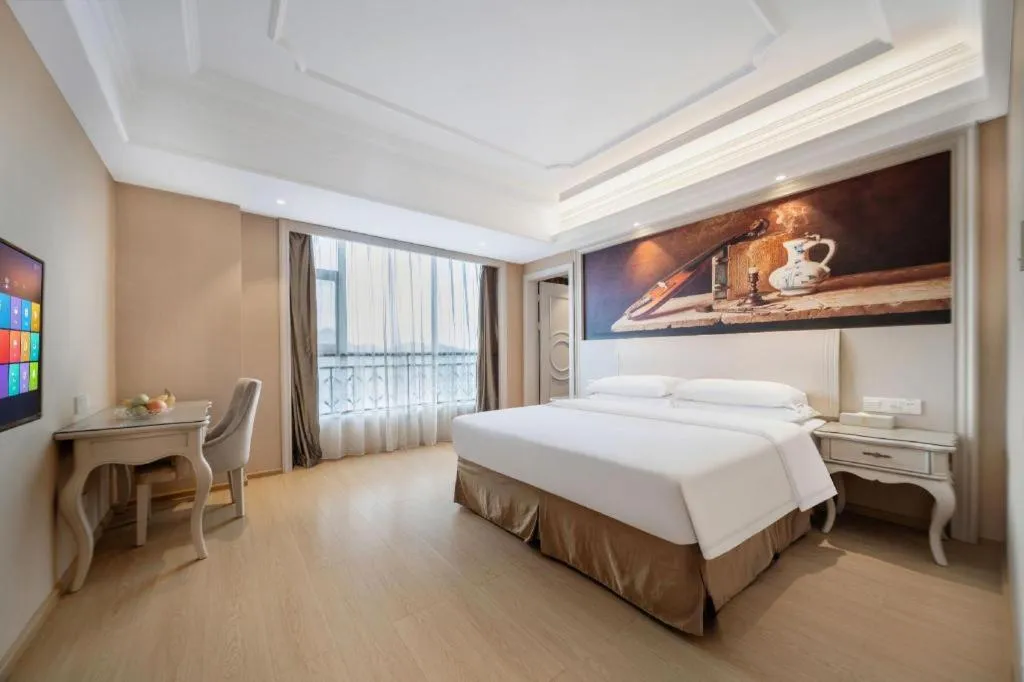 Bed in Vienna Hotel Guiyang Jiaxiulou Jichang Road