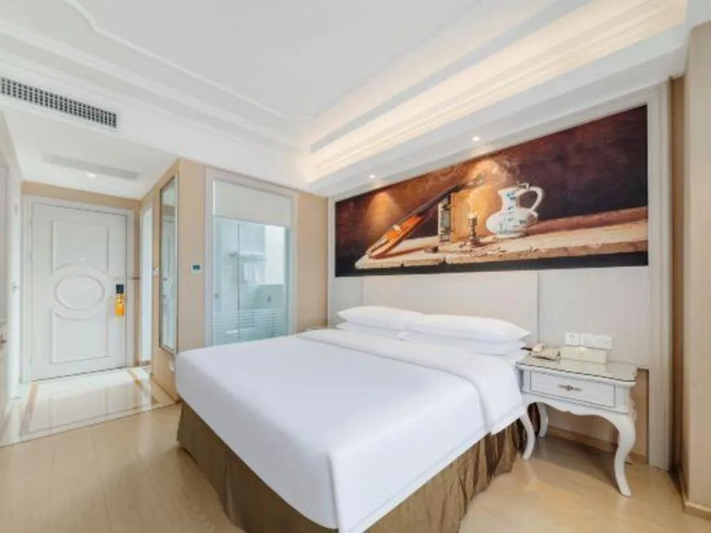 Bed in Vienna Hotel Guiyang Jiaxiulou Jichang Road