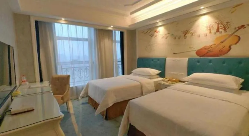 Bed in Vienna Hotel Guiyang Jiaxiulou Jichang Road