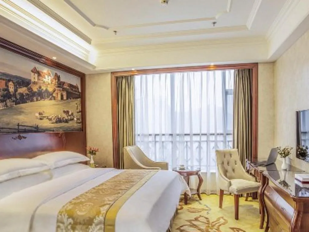 Bed in Vienna Hotel Guiyang Jiaxiulou Jichang Road