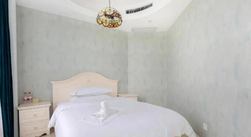 Bed in Vienna Hotel Guiyang Jiaxiulou Jichang Road