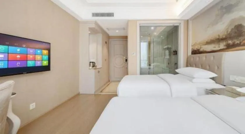 Bed in Vienna Hotel Guiyang Jiaxiulou Jichang Road