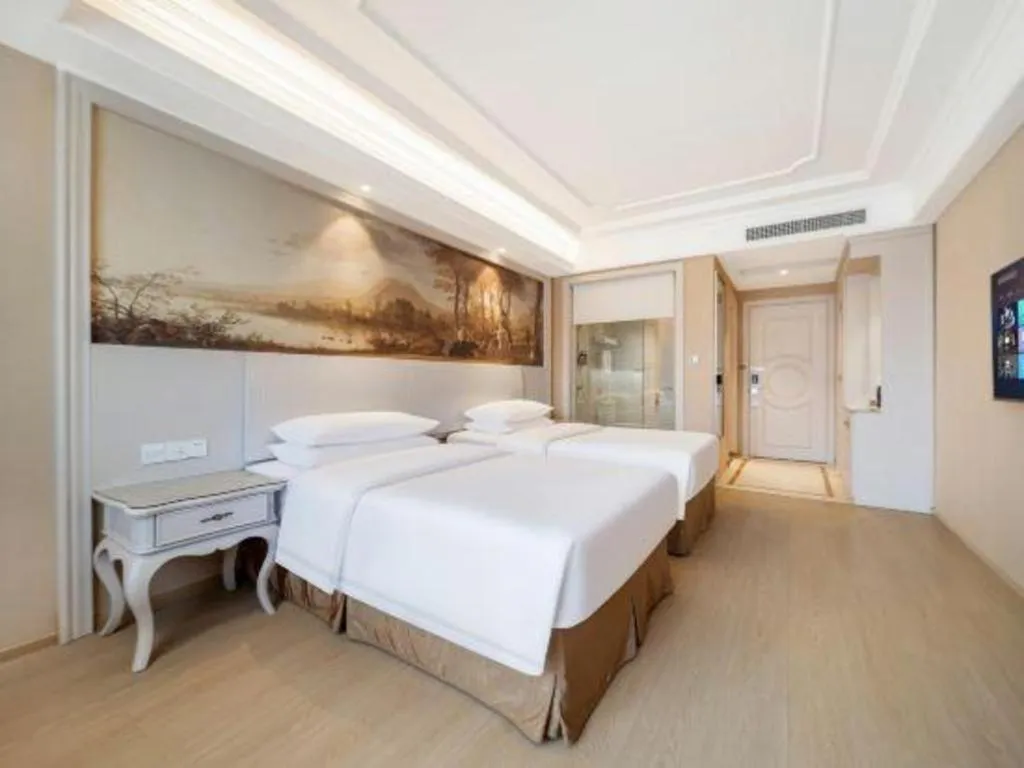 Bed in Vienna Hotel Guiyang Jiaxiulou Jichang Road