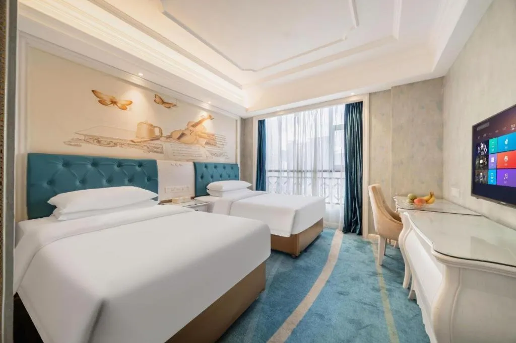 Bed in Vienna Hotel Guiyang Jiaxiulou Jichang Road
