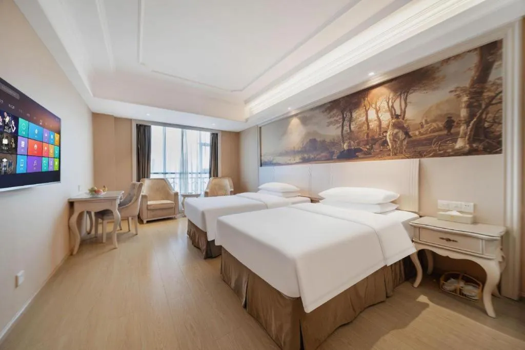 Bed in Vienna Hotel Guiyang Jiaxiulou Jichang Road