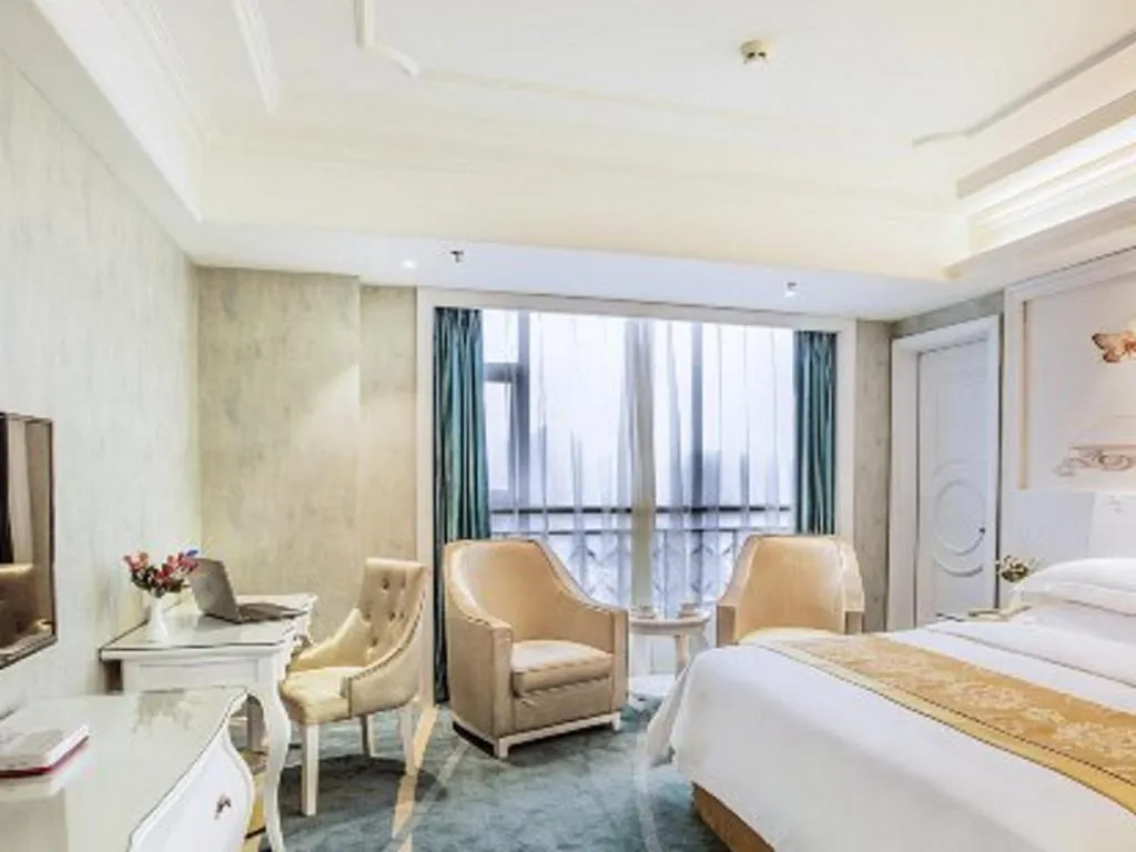 Bed in Vienna Hotel Guiyang Jiaxiulou Jichang Road