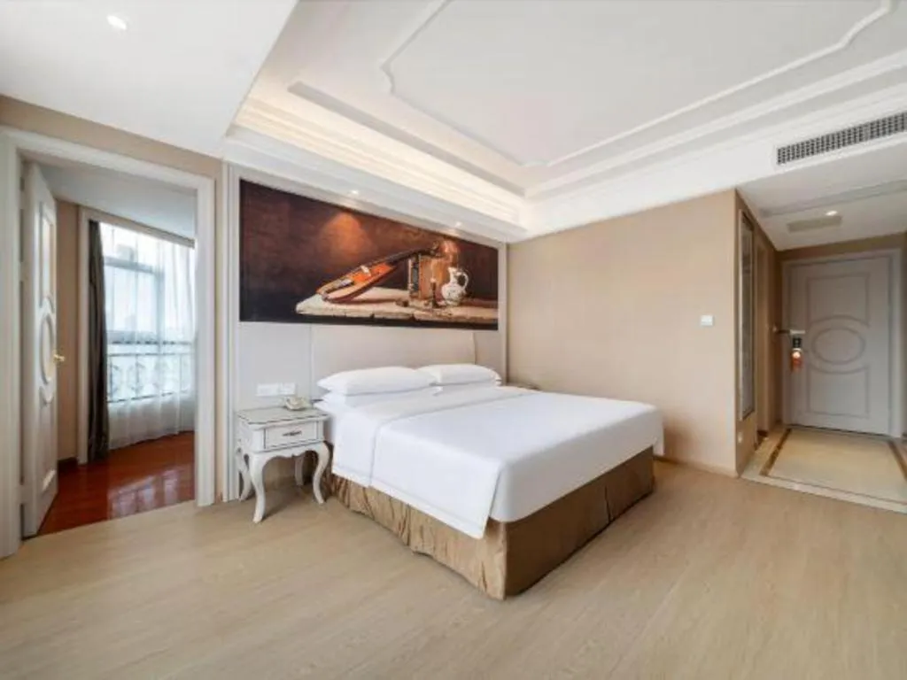 Bed in Vienna Hotel Guiyang Jiaxiulou Jichang Road