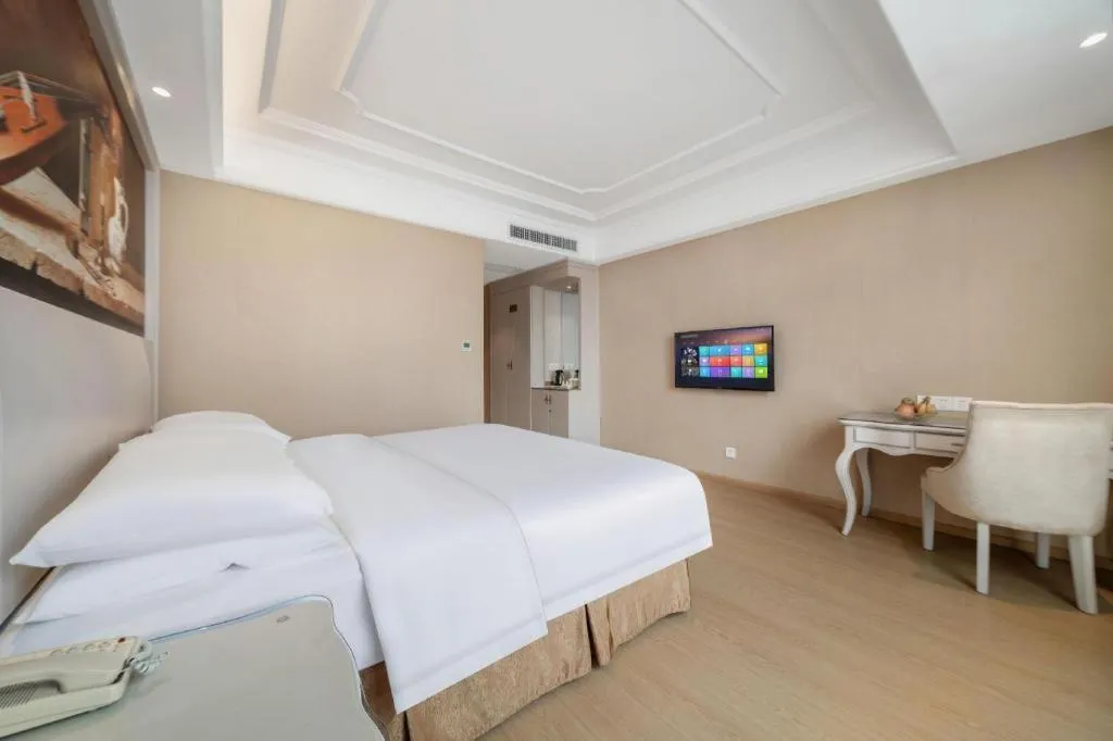 Bed in Vienna Hotel Guiyang Jiaxiulou Jichang Road