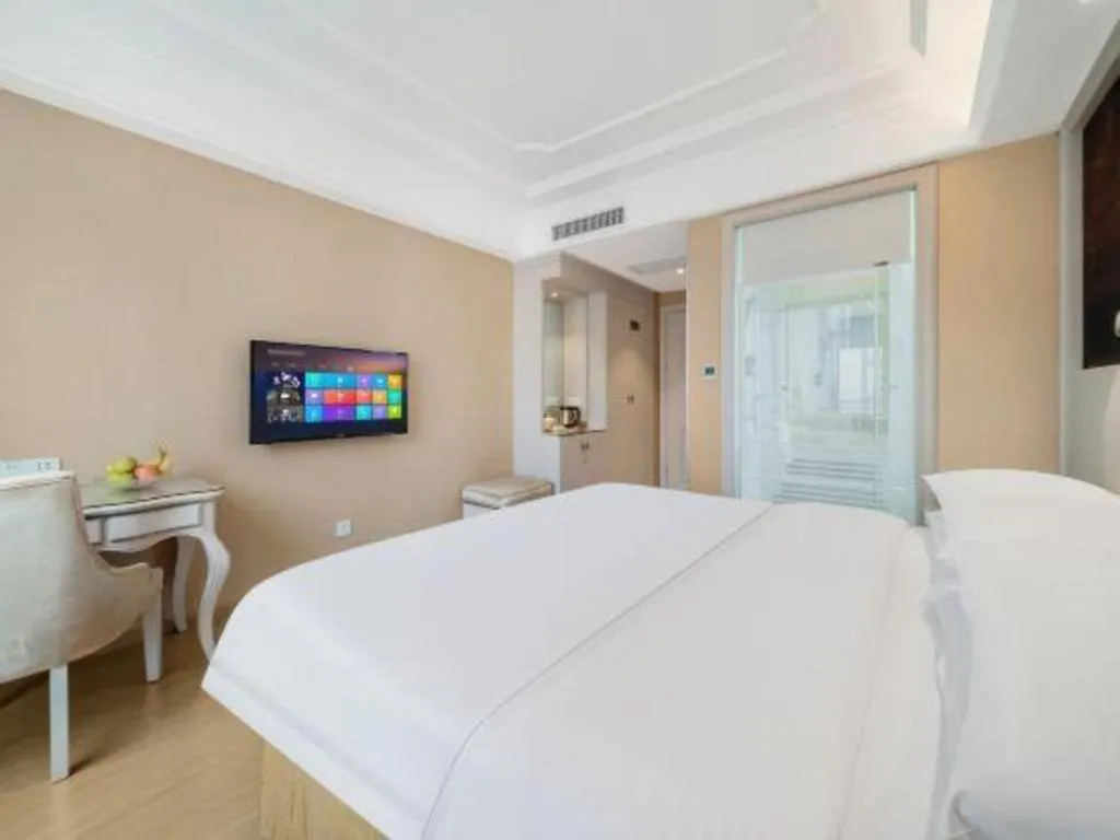Bed in Vienna Hotel Guiyang Jiaxiulou Jichang Road