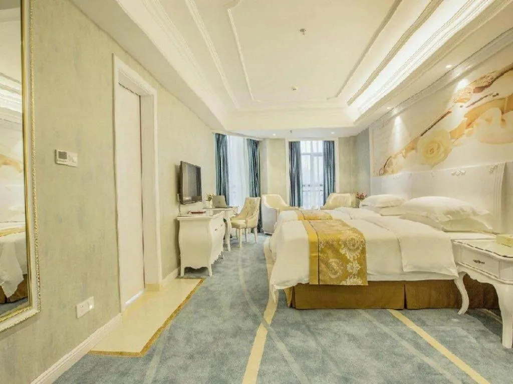 Bed in Vienna Hotel Guiyang Jiaxiulou Jichang Road