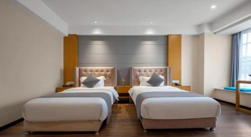 Bed in Xana Hotelle Chengdu East Railway Station Kaide Plaza