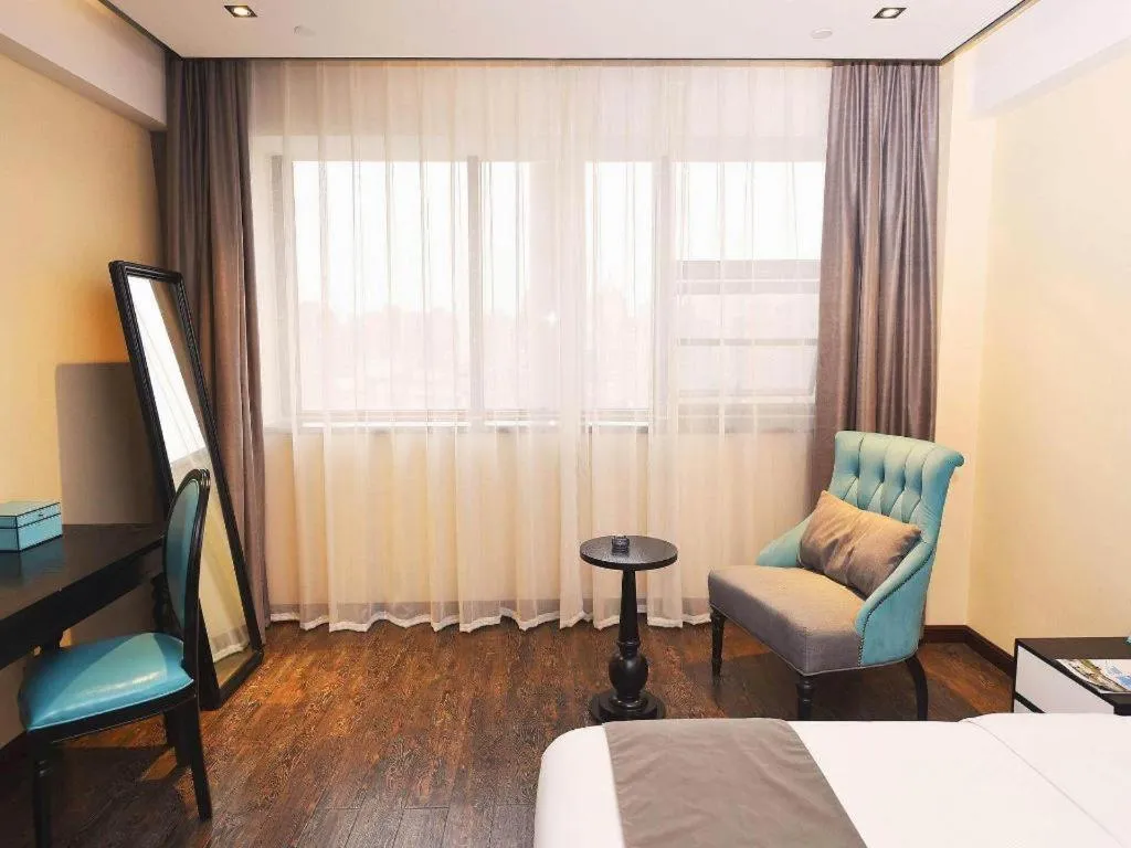 Bed in Xana Hotelle Chengdu East Railway Station Kaide Plaza