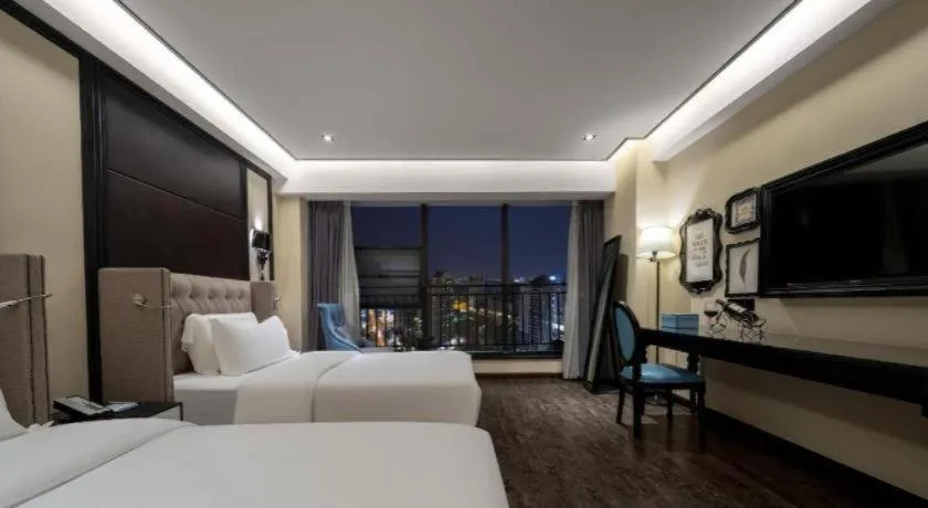 Bed in Xana Hotelle Chengdu East Railway Station Kaide Plaza