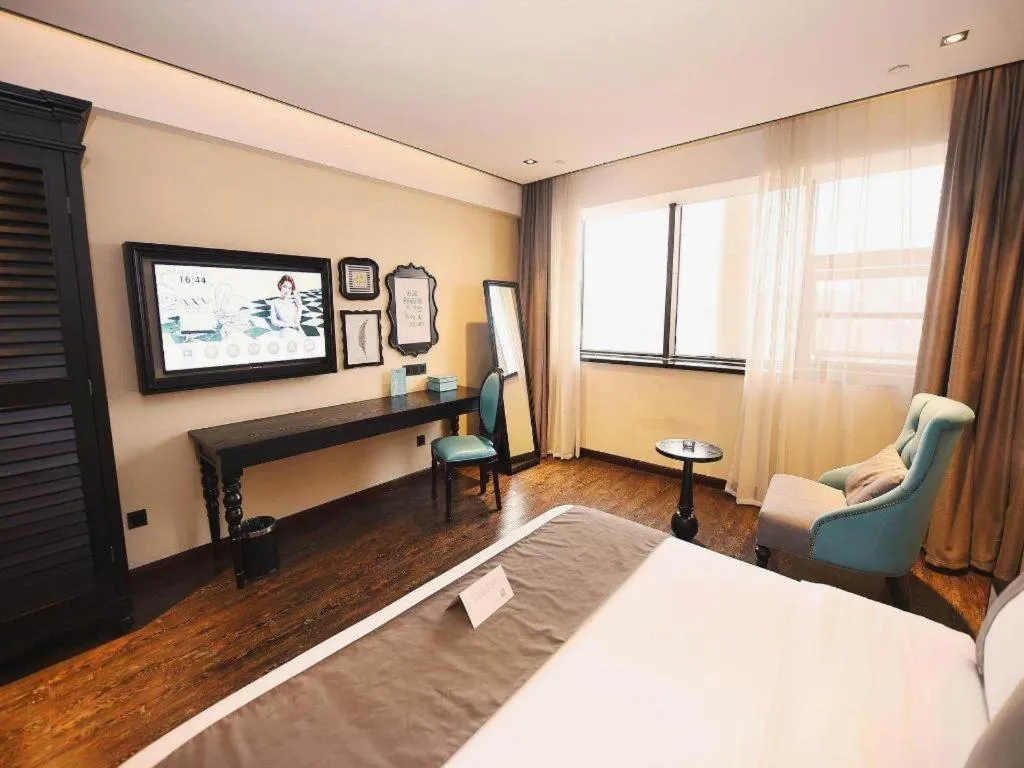 Bed in Xana Hotelle Chengdu East Railway Station Kaide Plaza