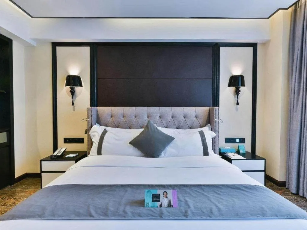 Bed in Xana Hotelle Chengdu East Railway Station Kaide Plaza