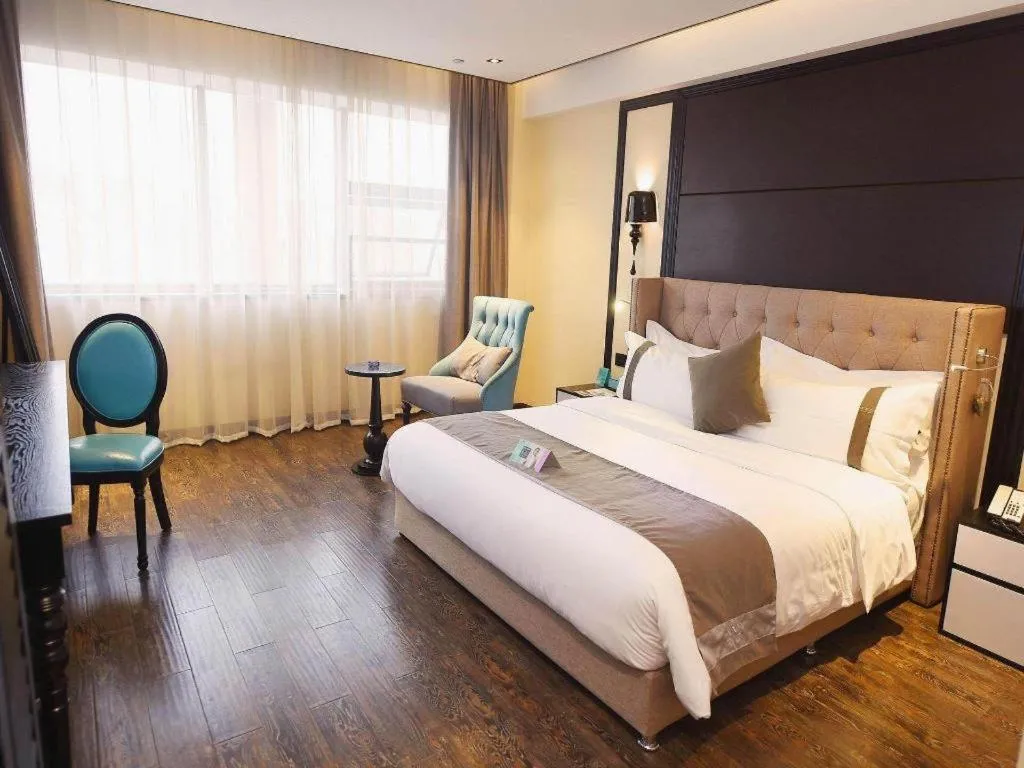 Bed in Xana Hotelle Chengdu East Railway Station Kaide Plaza