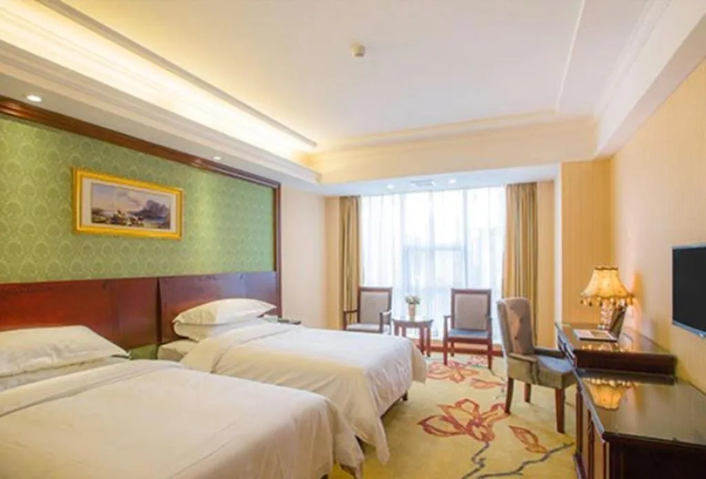 Bed in Vienna Hotel Hengyang Zhengxiang District Nanhua University