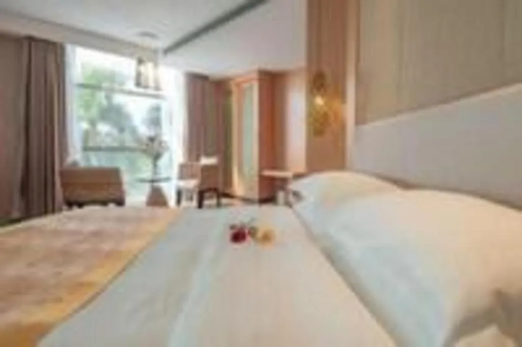 Bed in Excemon Beach Hotel Beihai
