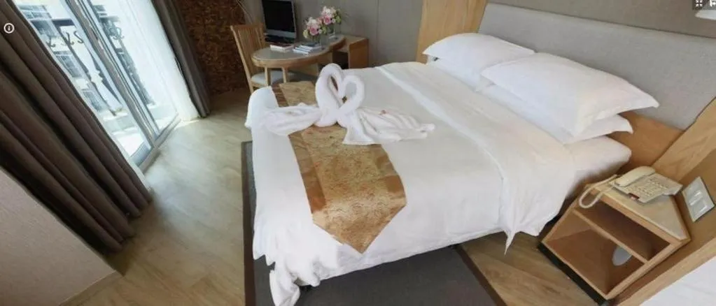 Bed in Excemon Beach Hotel Beihai