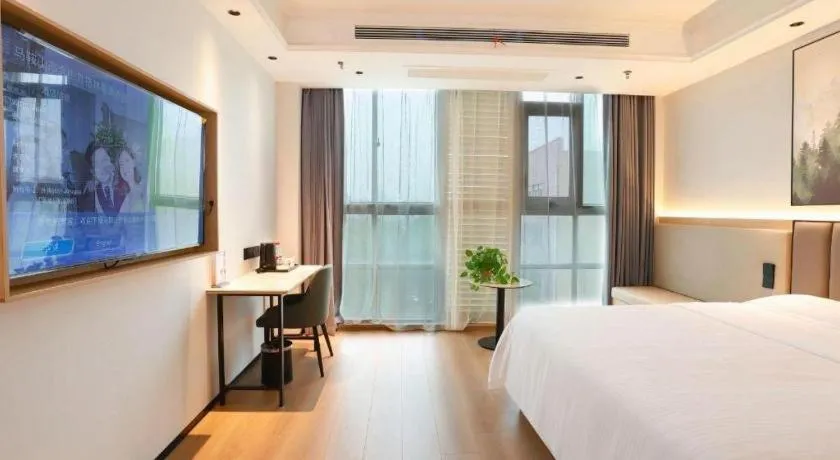 Bed in GreenTree Inn Maanshan Hanshan District Jiuwu Square Hotel