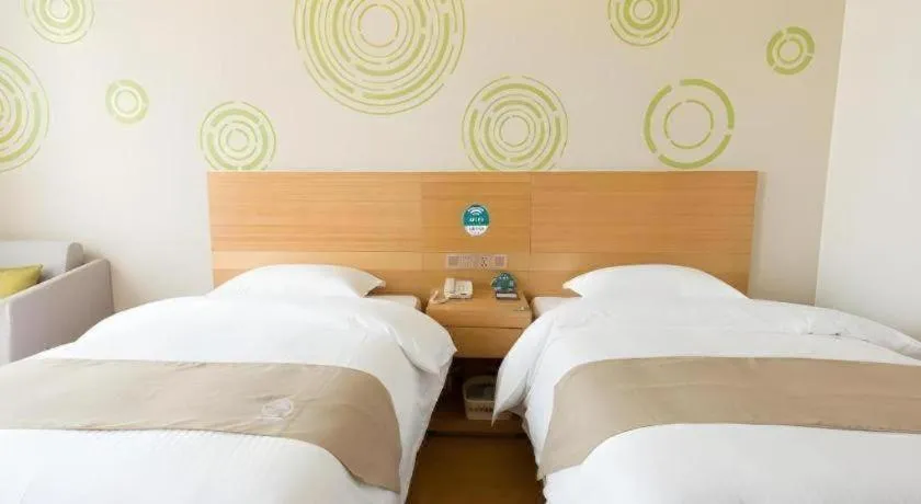 Bed in GreenTree Inn Maanshan Hanshan District Jiuwu Square Hotel