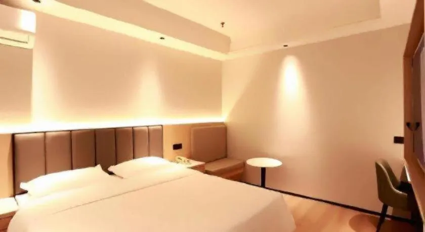 Bed in GreenTree Inn Maanshan Hanshan District Jiuwu Square Hotel