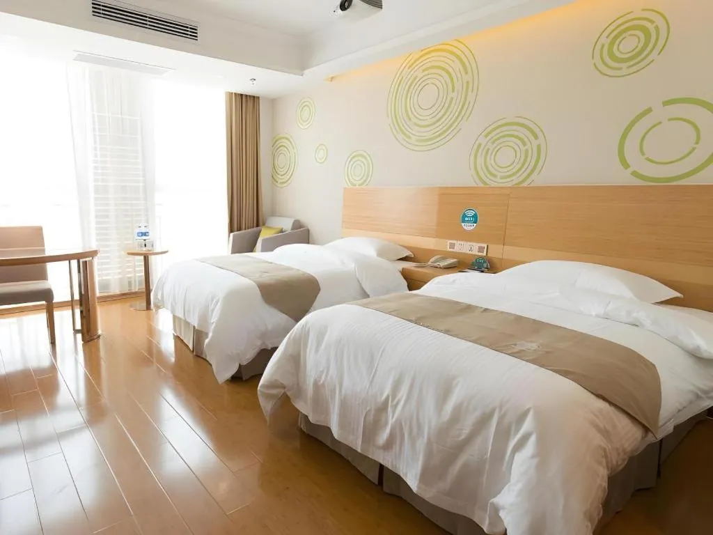 Bed in GreenTree Inn Maanshan Hanshan District Jiuwu Square Hotel