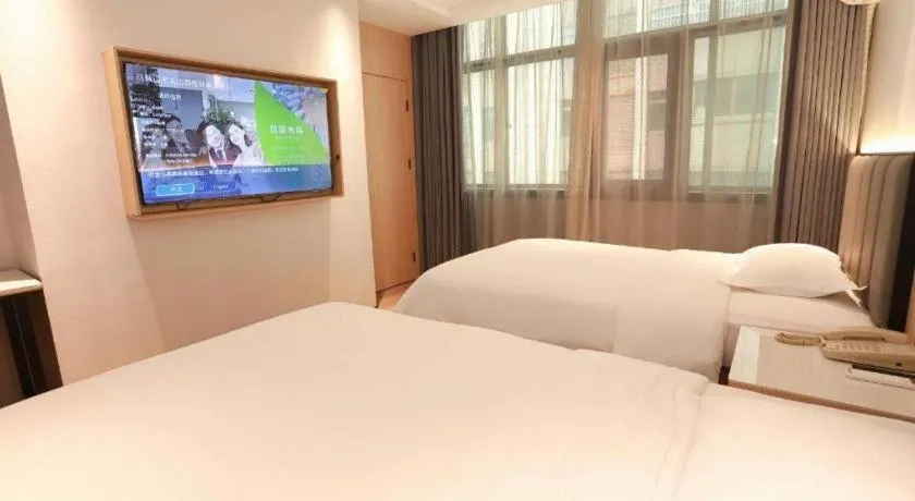 Bed in GreenTree Inn Maanshan Hanshan District Jiuwu Square Hotel