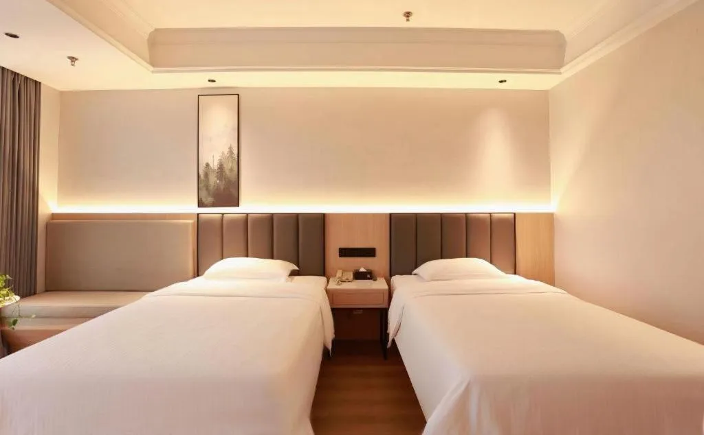 Bed in GreenTree Inn Maanshan Hanshan District Jiuwu Square Hotel