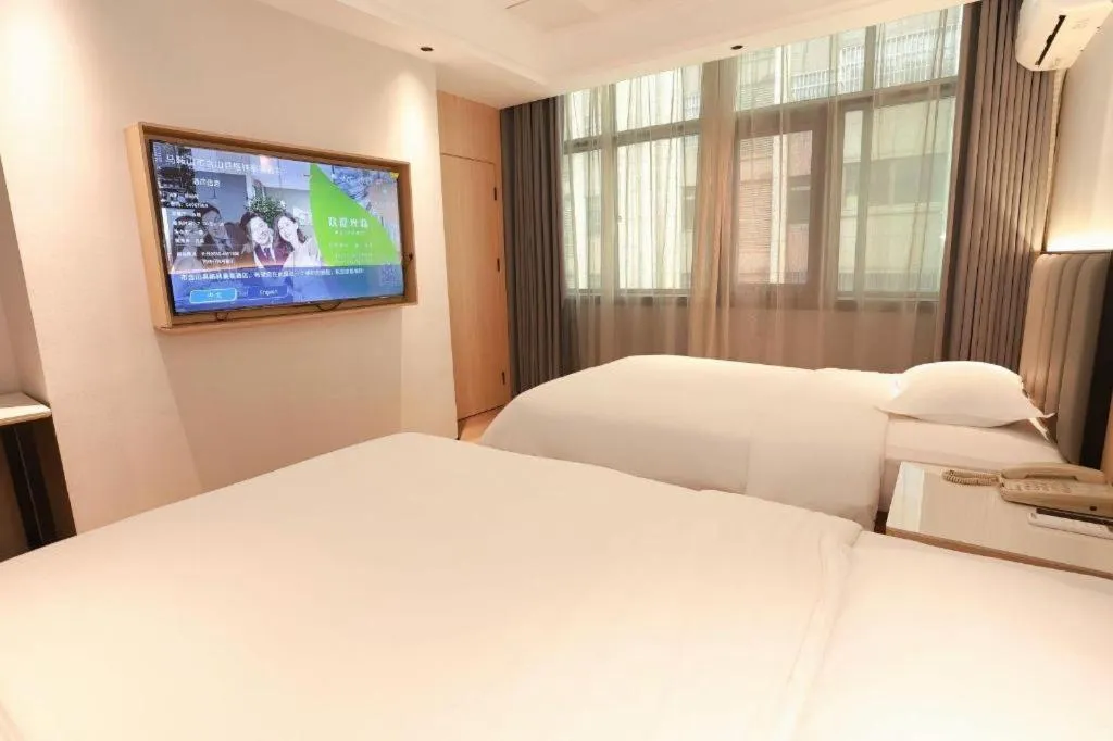 Bed in GreenTree Inn Maanshan Hanshan District Jiuwu Square Hotel