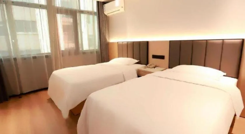 Bed in GreenTree Inn Maanshan Hanshan District Jiuwu Square Hotel